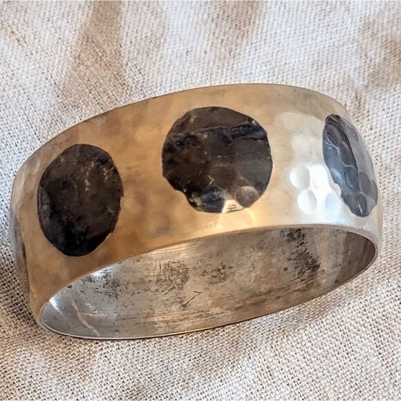 Silvertone Metal Polka Dot Hammered Bangle Bracelet - Picture 2 of 3